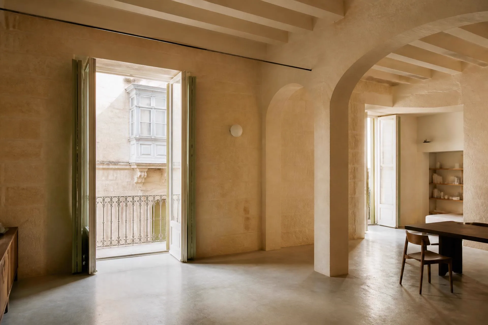 Renovated open-plan apartment living room in a Malta seafront block